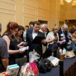 Guests Looking at Auction Items - Tuxedo Cat Ball 2018