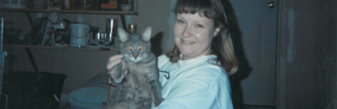 Founder Pam and Cat In Garage That Served As Early Shelter