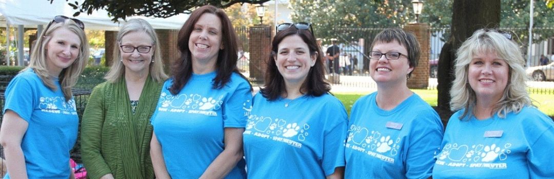 Volunteers Posing With Founder Pam Miller